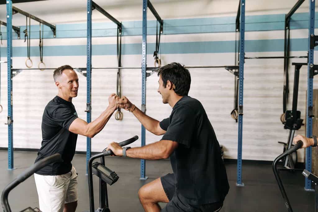 Gym owner planning for new year with December fitness business tips